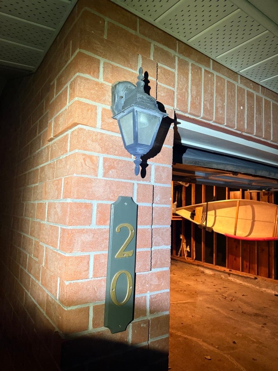 Exterior light fixture replaced — before